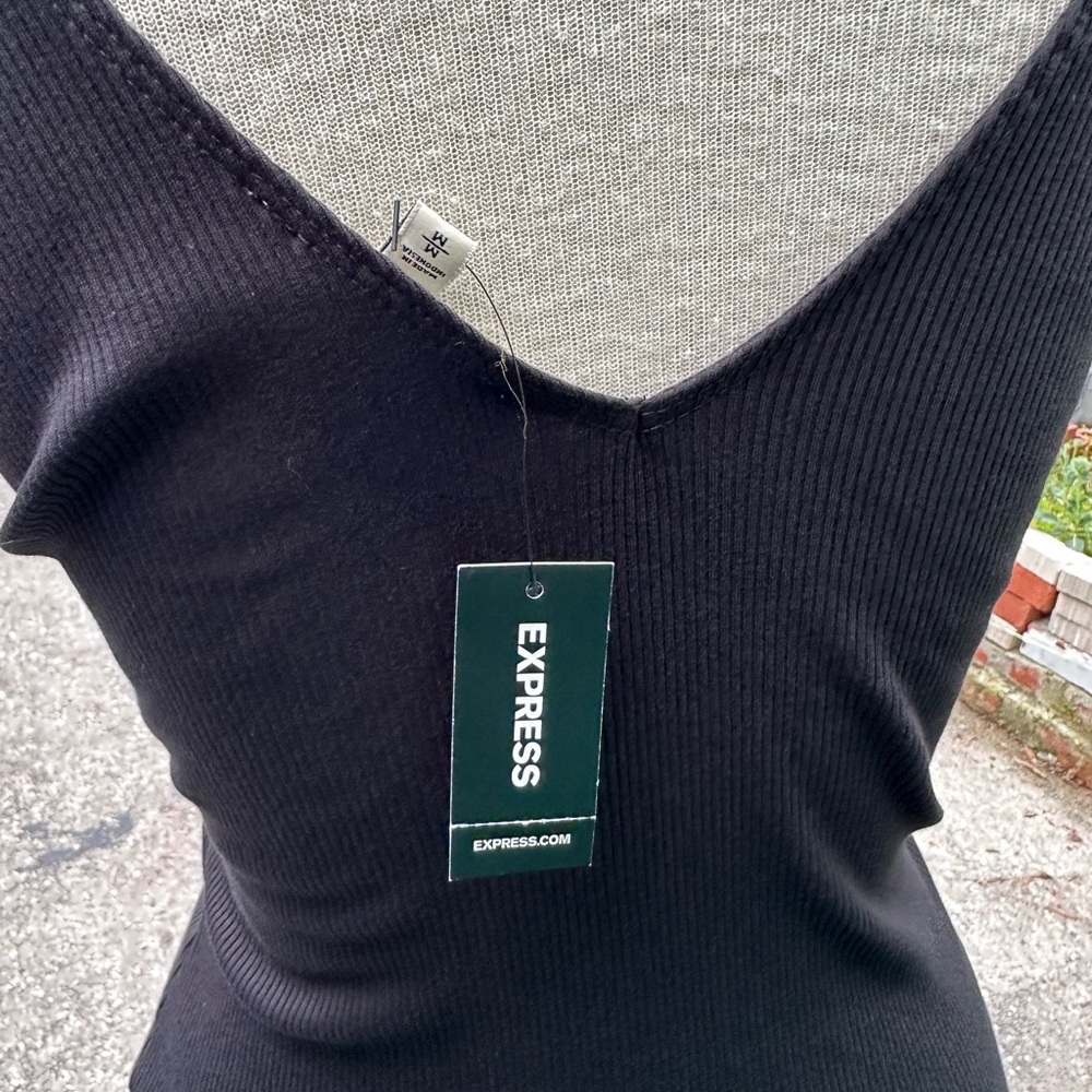 black short sleeve V neck top.